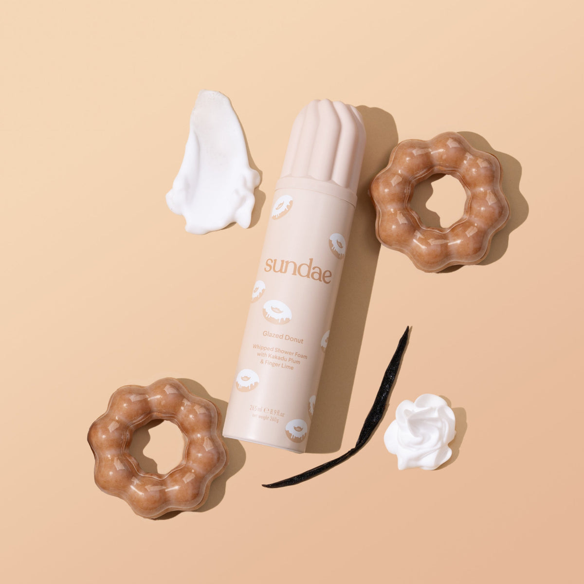 Gel douche moussant Glazed Donut Sundae Body avec donuts sur fond beige
